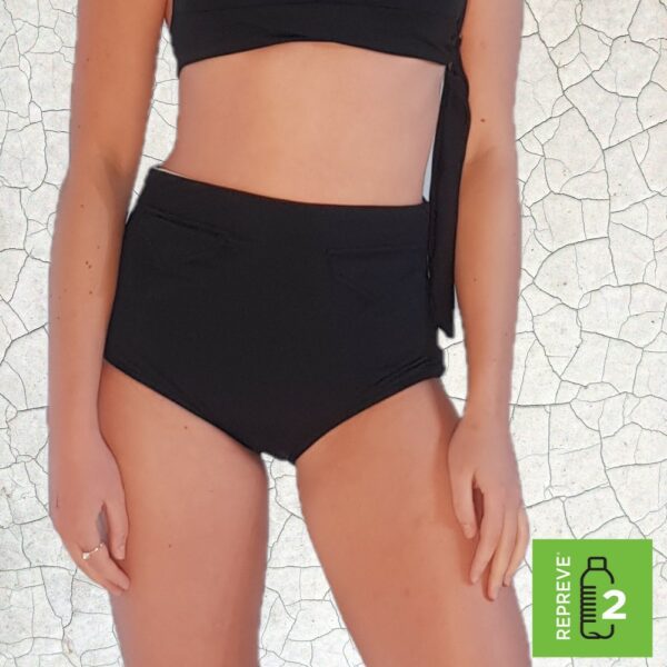 girls torso pic with black bikini bottom