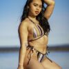 girl wearing stripe bikini bottom